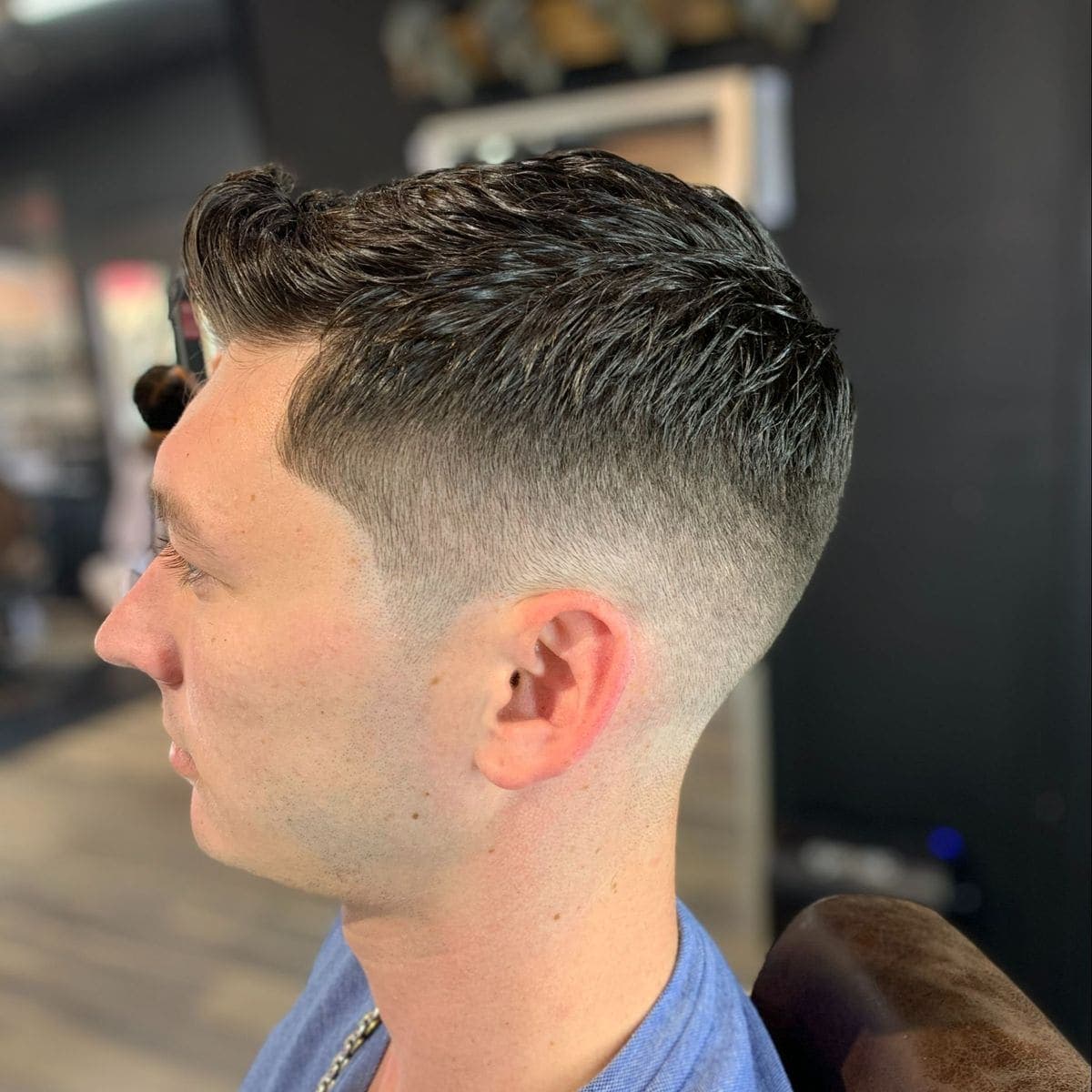 Mid fade with textured crop side profile