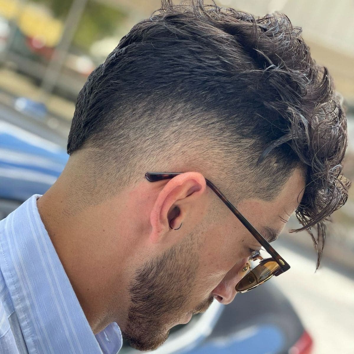 Curly top undercut with skin fade